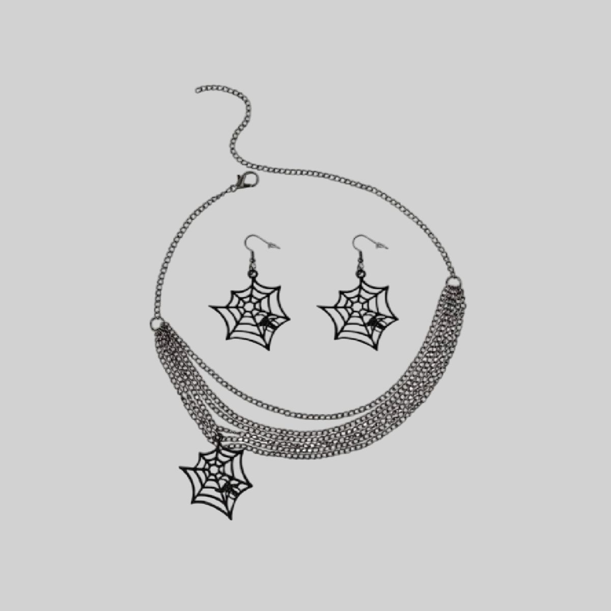 Collar y aretes con diseño de araña
