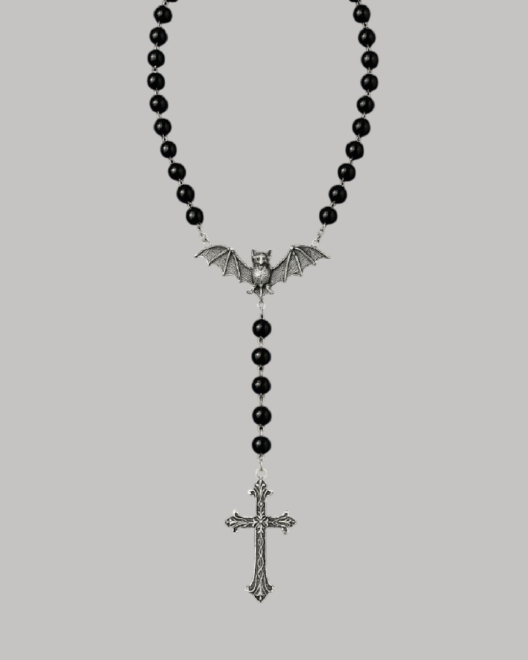 Crucifijo con murciélago y cruz colgante