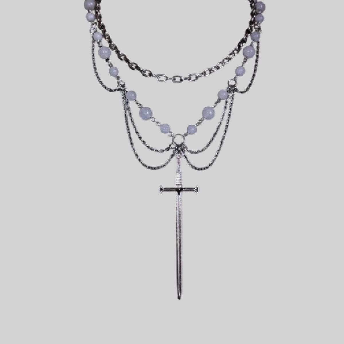 Cadena de bolitas con cruz