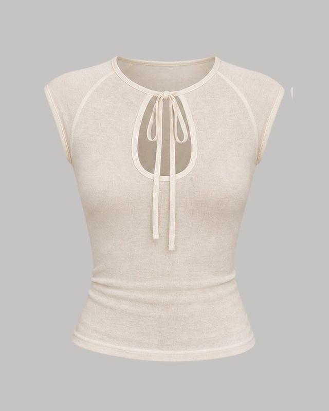 Blusa con cuello y lazo delantero