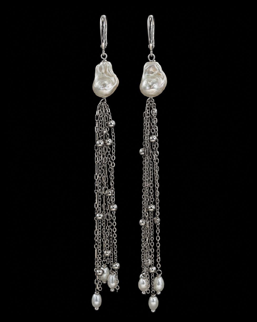 ​Aretes con concha nácar y cadenas