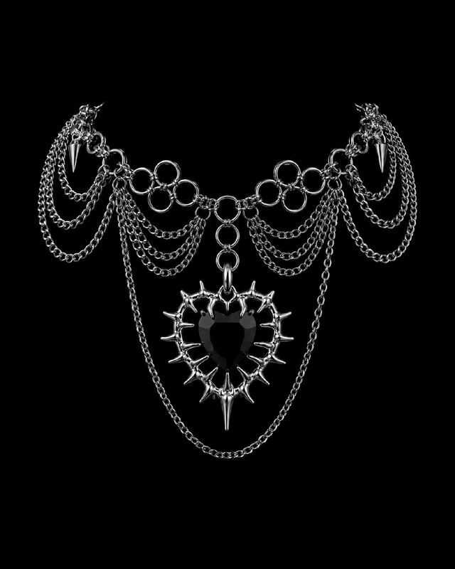 ​Collar handmade con dije de corazón de púas