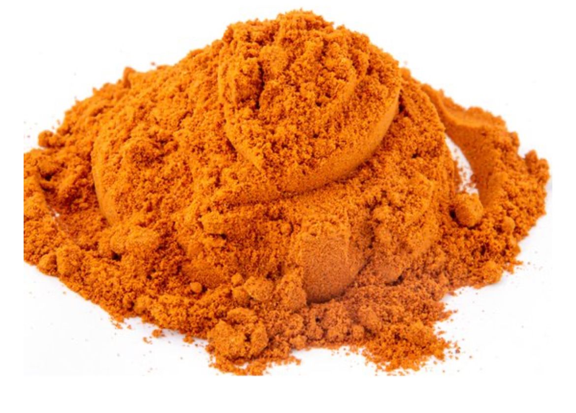 Chicken with herbs and salt: orange-colored powdered spices with herbs, with an aromatic and salty flavor
