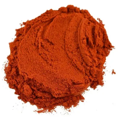 Paprika powder: a bright red spice, sweet or hot, used to flavor and color dishes