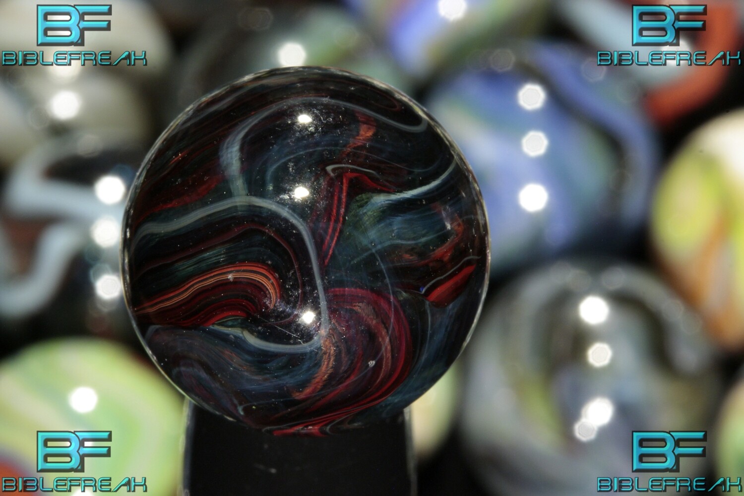 00004776 One (1) JABO 2009 Ultra Run &quot;Black Blood&quot; Strong UV 3/4&quot; +/- MINT 9.0 Marble