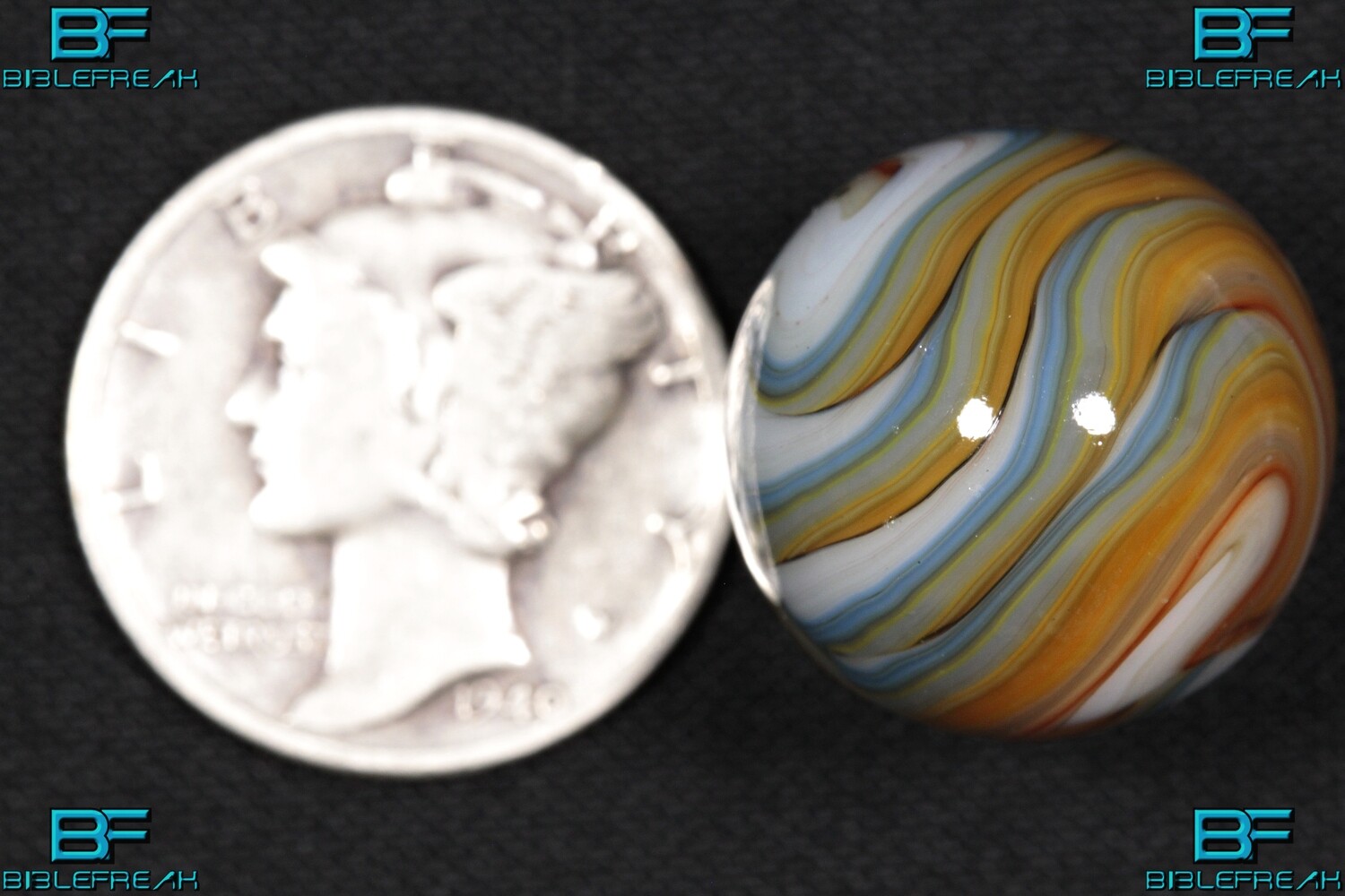 008328 One (1) SMM 2013 FLAMEY &quot;TIN LIZZY&quot; 5/8&quot; +/- Mint 9.0 Swirl Marble