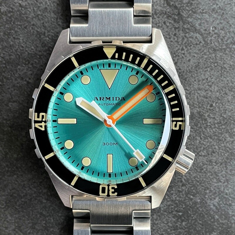 Armida A1 38mm steel turquoise sunray dial orange minute sapphire bezel