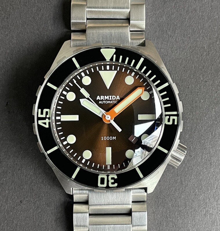 Armida A1 45mm steel sunray brown dial orange minute ETA