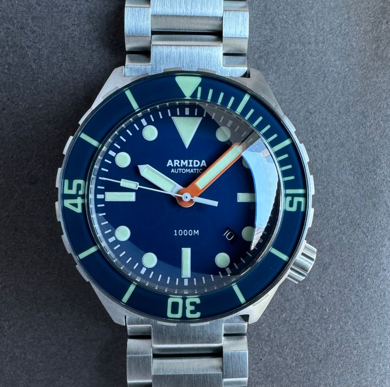Armida A1 45mm steel ceramic blue dial orange minute ETA