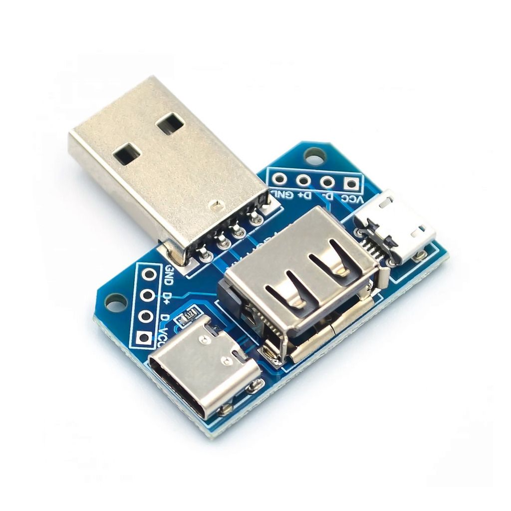 Płytka adaptera : wtyk USB, gniazdo USB-C, gniazdo microUSB, gniazdo USB.