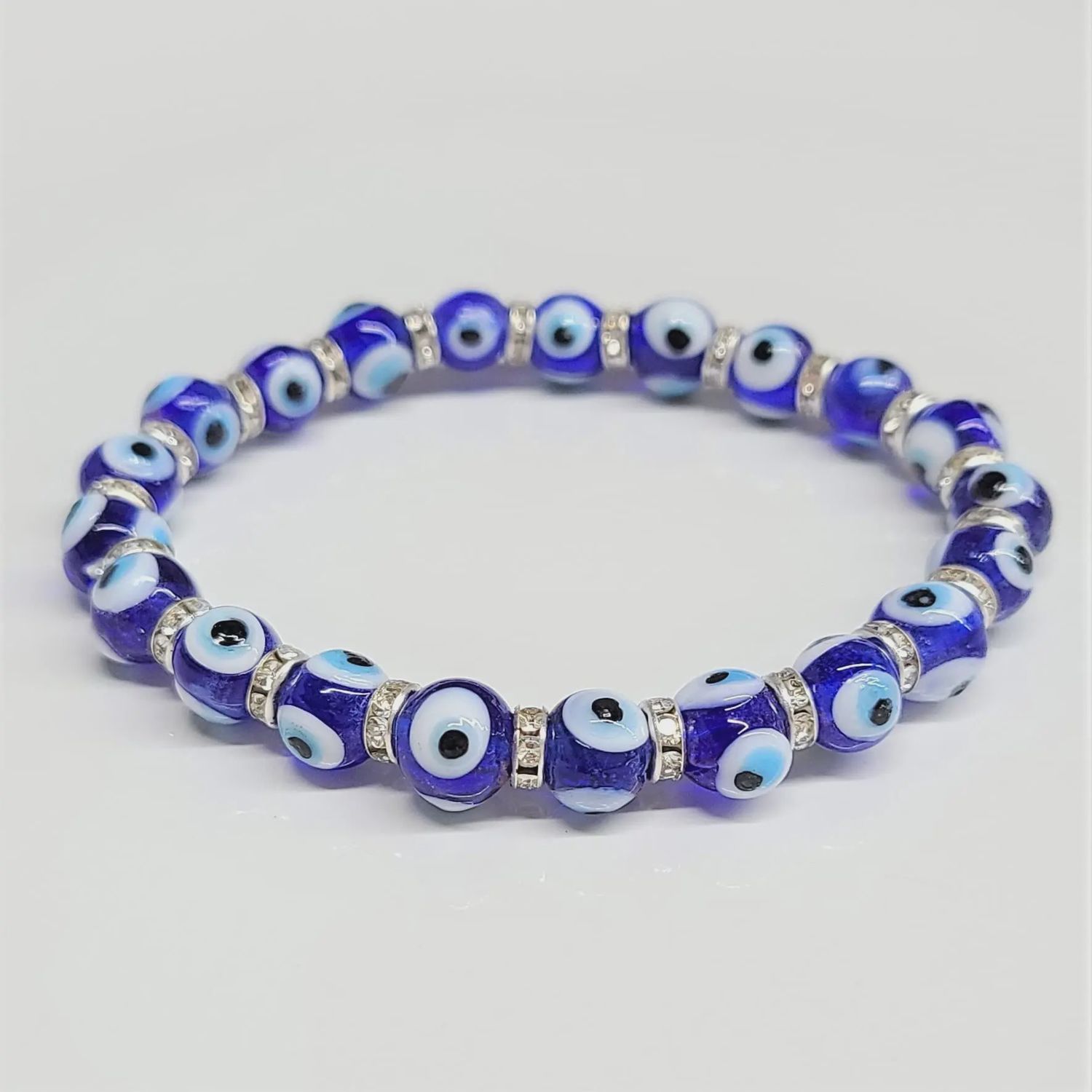 GB Evil Eye blue 8mm elastic bracelet w/ silver spacers