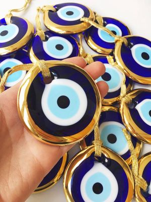 Evil Eye bead w/ gold cord, 7cm