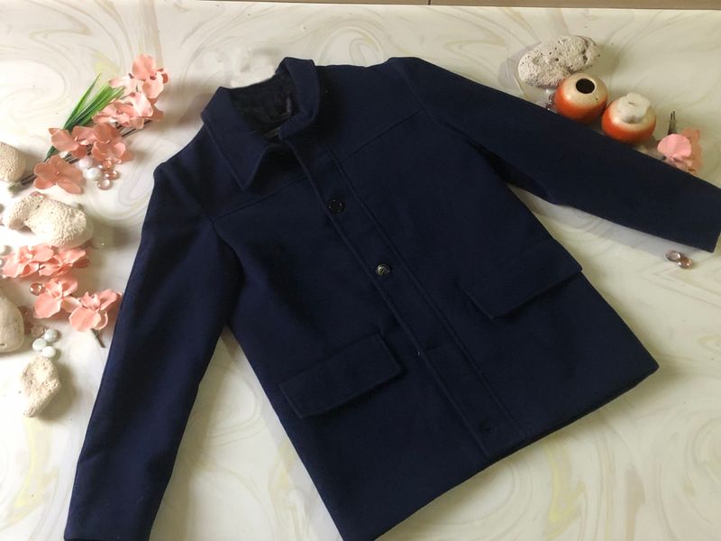 ABRIGO NIÑA CAPUCHA Y MOÑO AZUL