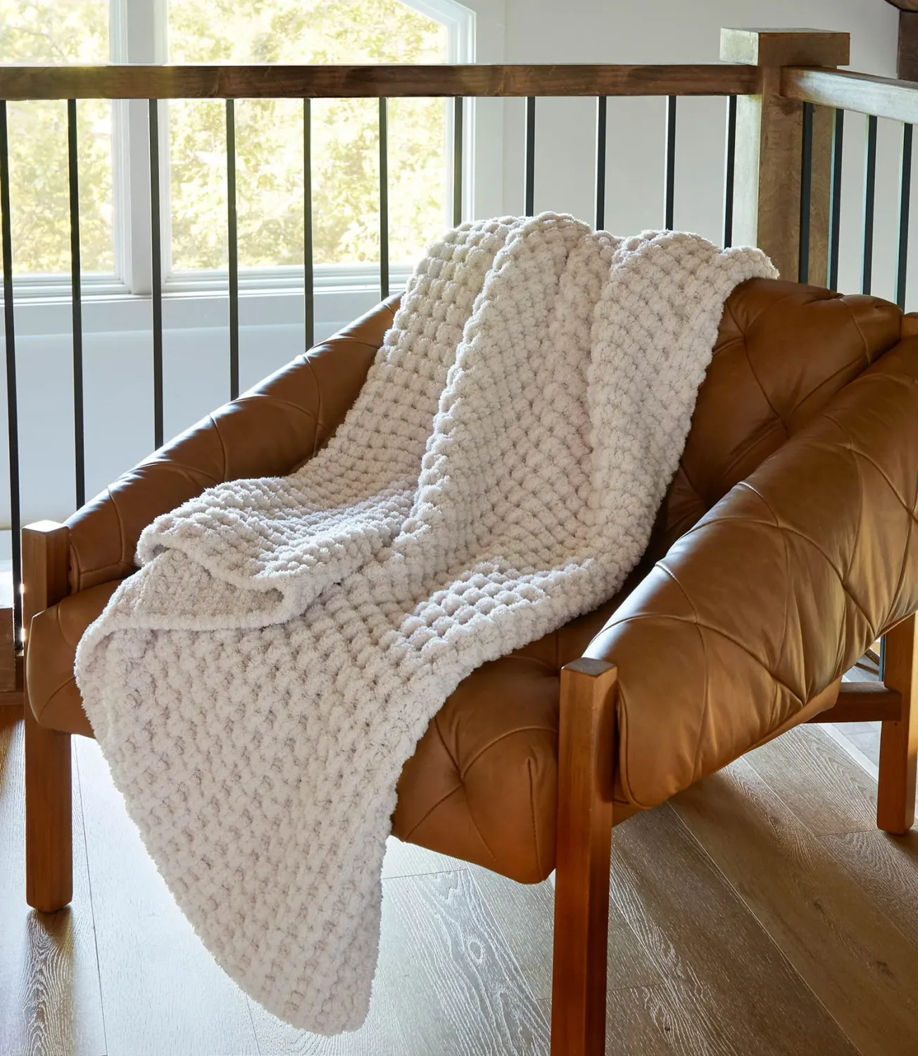 COZY THROW CABLE KNIT