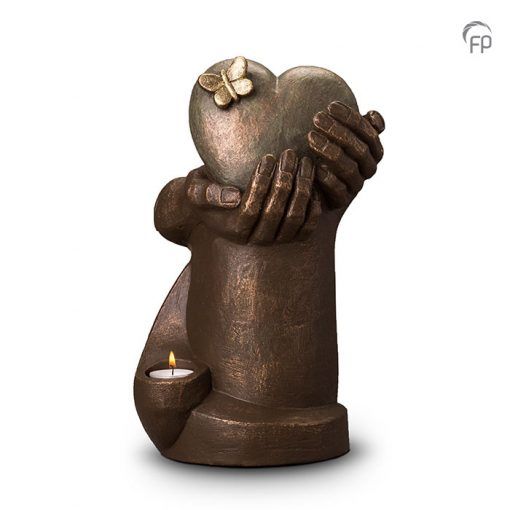 Ceramic urn Heart in Hands with candle