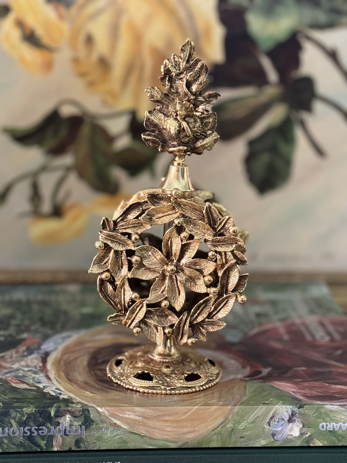 Gilded perfume bottle