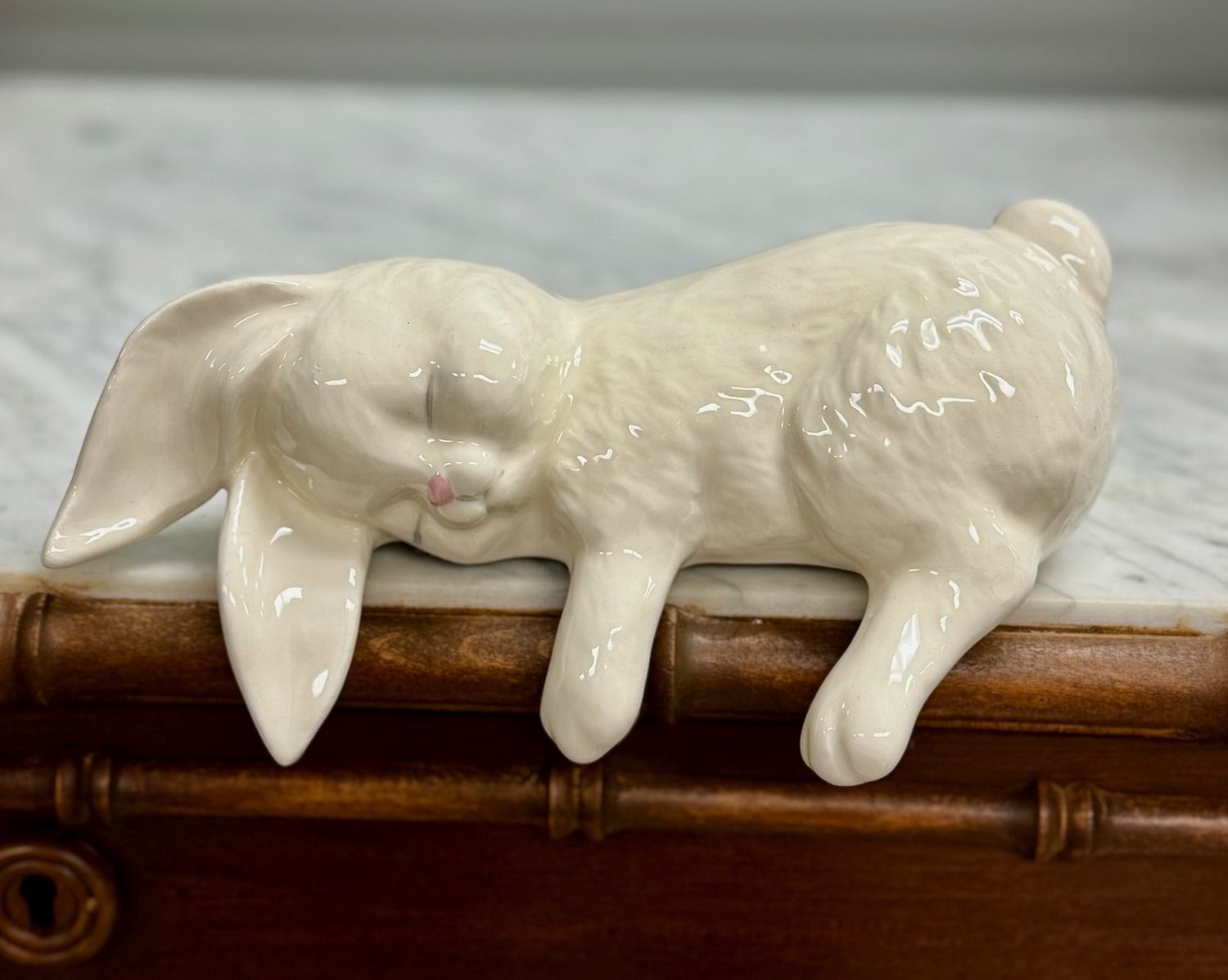White porcelain sleeping bunny