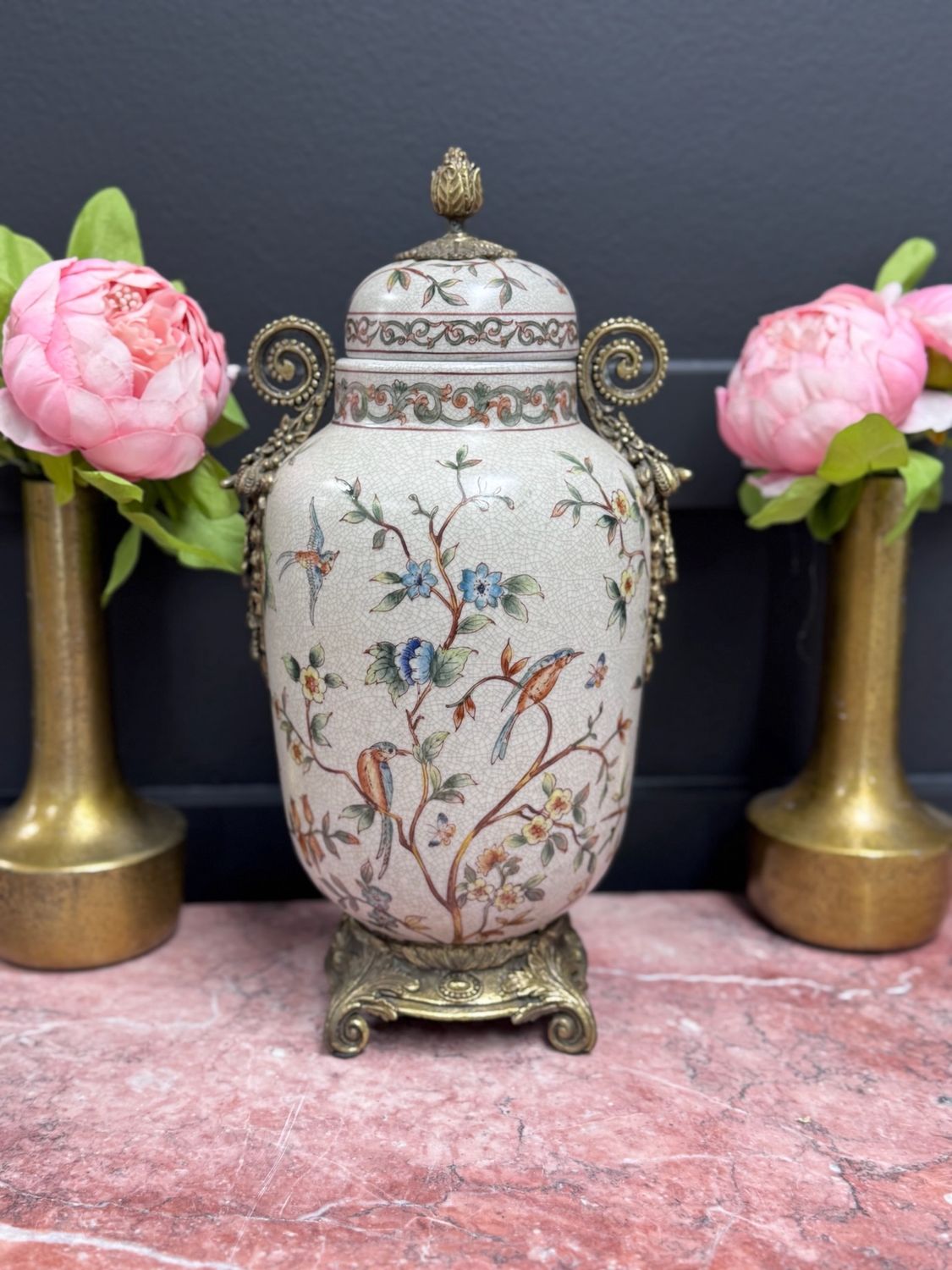 Floral hand painted lidded vase by Dominic