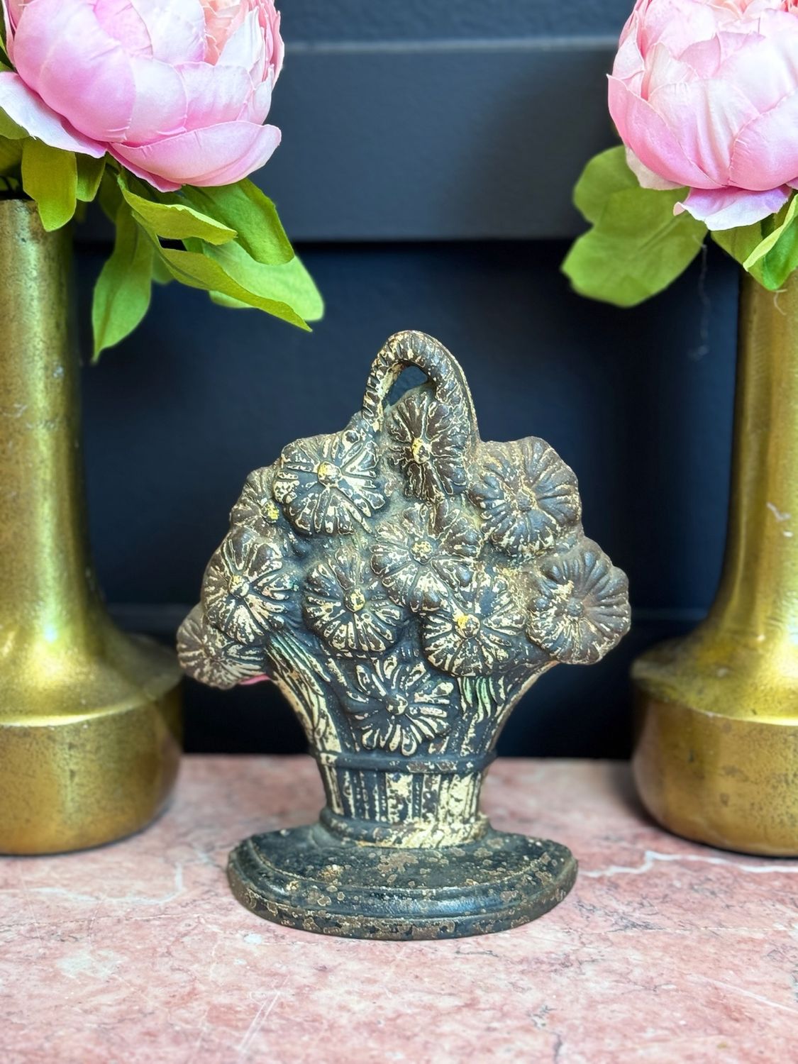 Cast iron floral basket doorstop