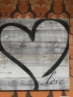 Love heart sign on distress wood