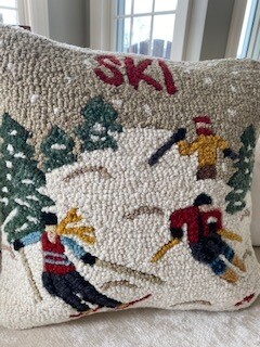 3 skiers skiing pillow
