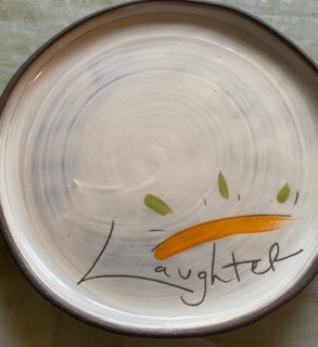 &quot;Laughter&quot; ceramic small round plate