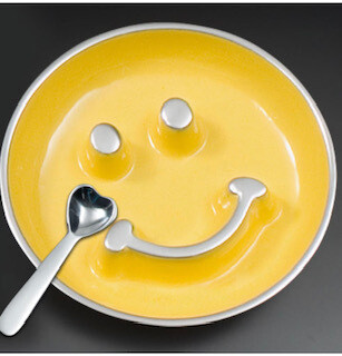 Yellow smiley dish with heart spoon