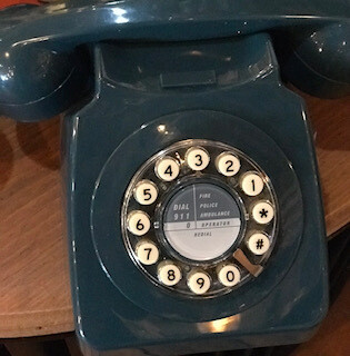Blue phone with white dials