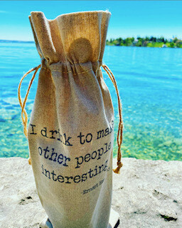"I drink to make people interesting." ~Ernest Hemingway    wine bag
