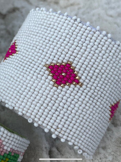 White cuff with pink diamond bracelet