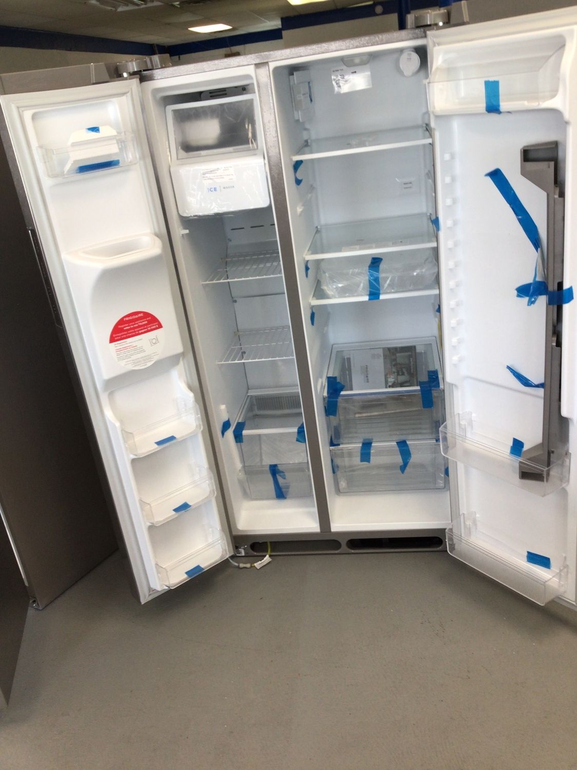 FRSS2623AS-6 Frigidaire 25.6 cu.ft. Side by Side with Ice Maker Stainless Steel Energy Star H.68 W.36 D.33