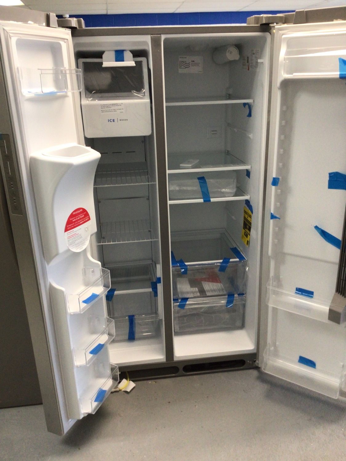 FRSS2623AS-8 Frigidaire 25.6 cu.ft. Side by Side with Ice Stainless Steel Energy Star H.68 W.36 D.33