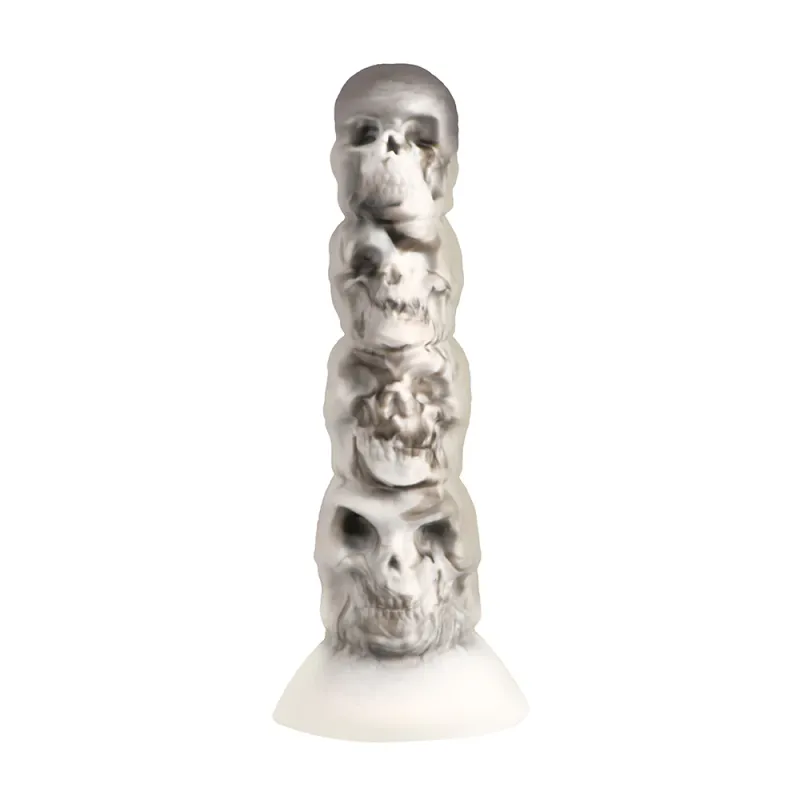 The tower of doom dildo out of its box, showing off its white flared base.