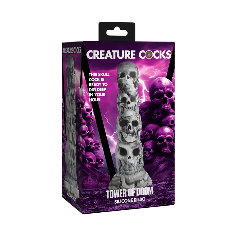 The Creature Cocks Tower of Doom dildo, shown in front of a swirling purple background with an illustrated tower of skulls. The toy is poured in gray and black marbled silicone, made to resemble four unique skulls of decreasing size stacked on top of each other.