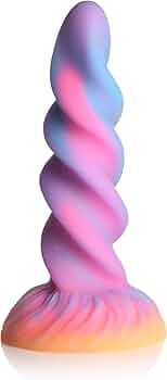 A close-up on the center of the moon rider, showing off its pink core and purple/blue outer swirl.