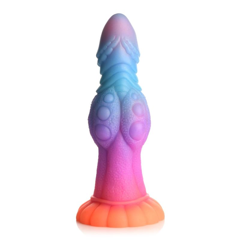 The galactic cock alien creature dildo out of its box, shown standing straight upright.