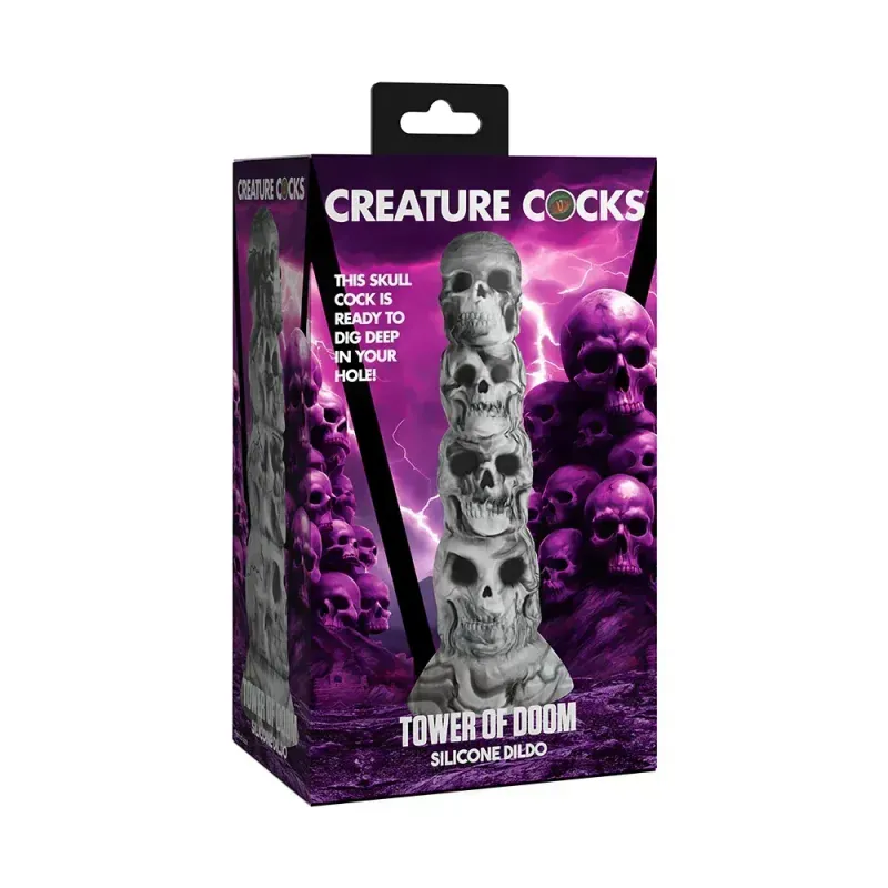 The Creature Cocks Tower of Doom dildo, shown in front of a swirling purple background with an illustrated tower of skulls. The toy is poured in gray and black marbled silicone, made to resemble four unique skulls of decreasing size stacked on top of each other.