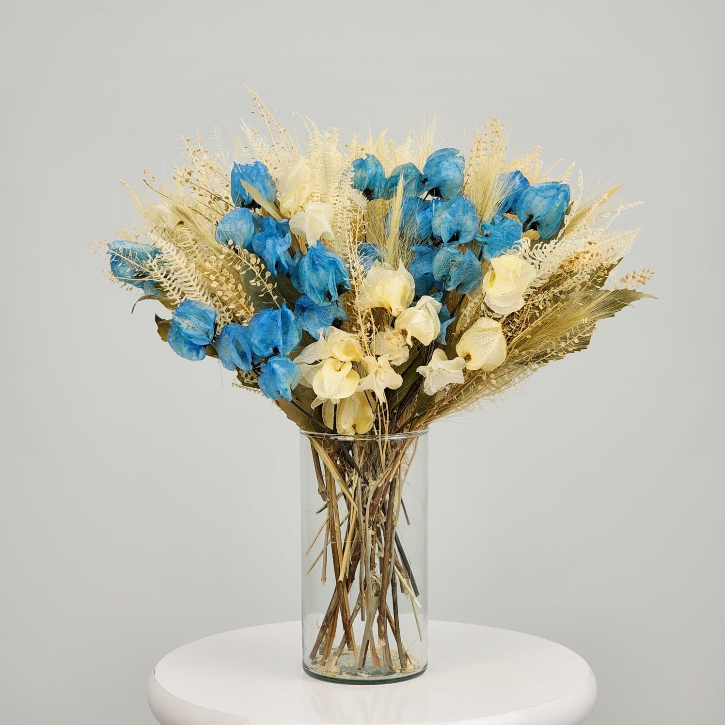 Dried Flowers Single Face Dengo Arrangement  Blue  + Clear Glass Vase