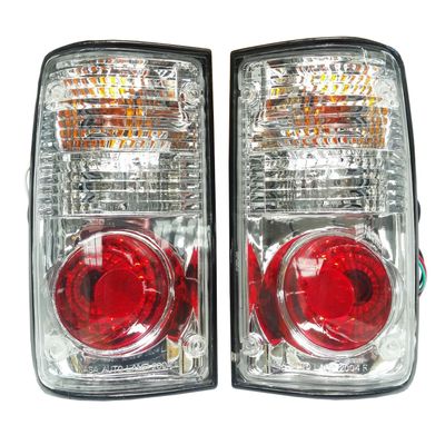 CLEAR LENS TAILLIGHTS BRAKE LAMPS PAIR FOR TOYOTA HILUX LN85 015 - COMPLETE WITH GLOBES