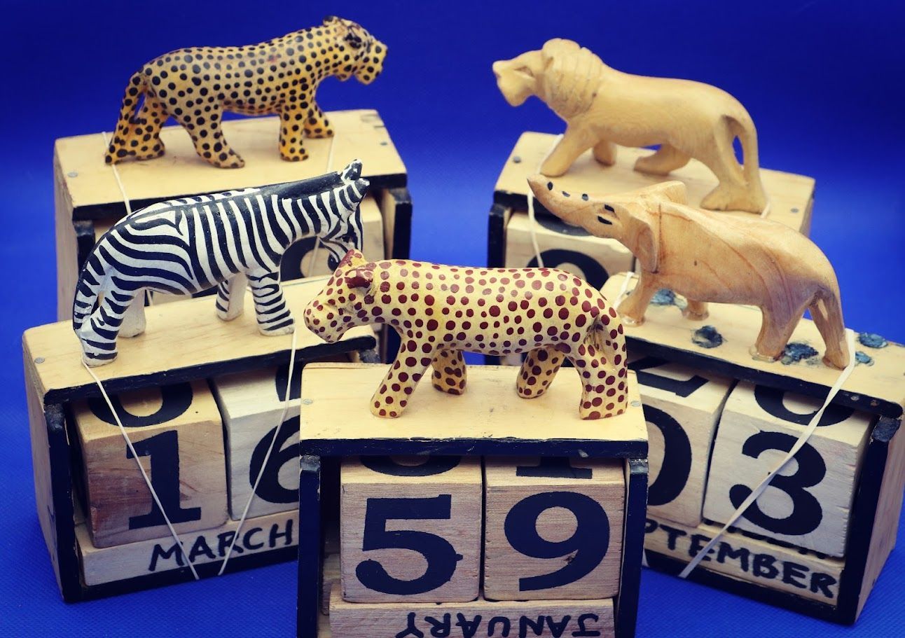 Calendar, Wood African Animal Statue