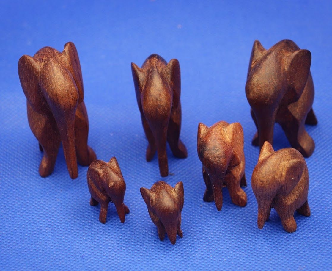 Elephant family wood carving