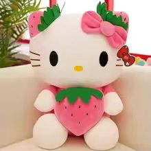 Hello Kitty Holding a Pink Strawberry Plush