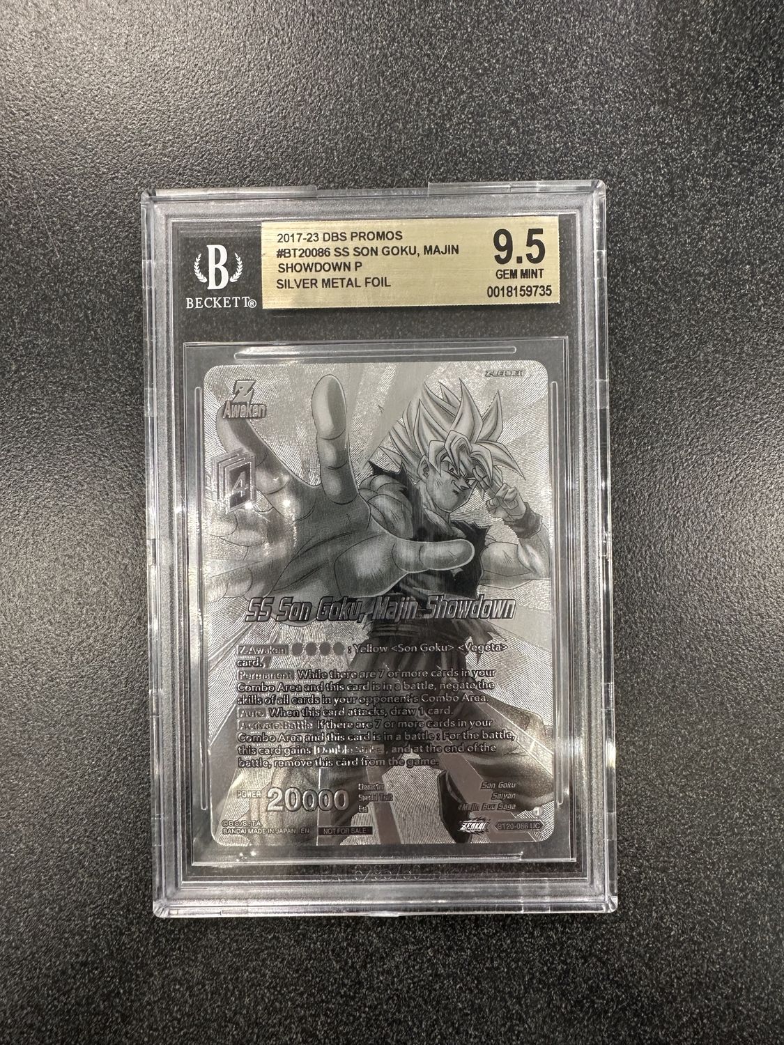 BGS 9.5 - 2017-23 DBS Promos #BT20086 SS SOn Goku , Majin Showdown P Silver Metal Foil - [0018159735]