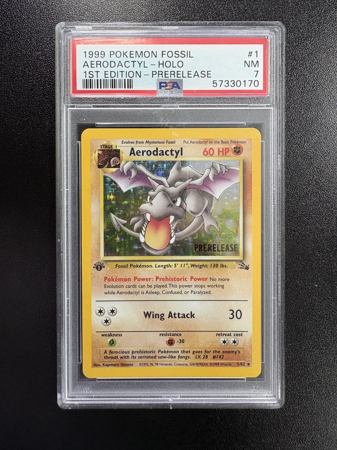 PSA 7 - 1999 POKEMON FOSSIL #1 AERODACTYL-HOLO 1ST EDITION-PRERELEASE [57330170]