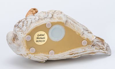 Baby In Angel Wings Urn (Dark skin tone)     U-BIW-BK