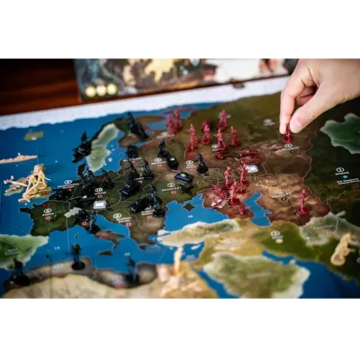 Axis &amp; Allies: 1942 Second Edition game board with plastic miniatures positioned across Europe and Asia.
