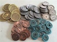 Scythe metal coins piled and sorted.