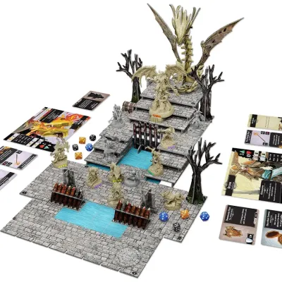 Descent: Legends of the Dark table setup with 3D terrain, hero miniatures, monster figures, cards, and dice.