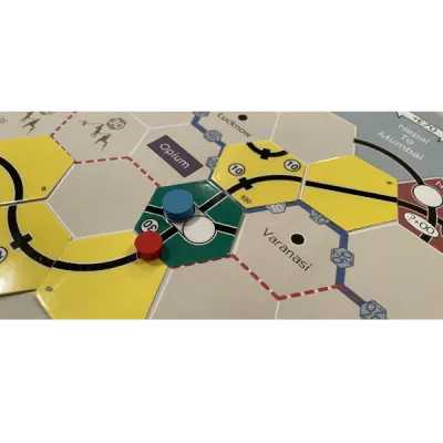 18 India gameplay close-up with railway tiles, route markers, and colored company tokens.