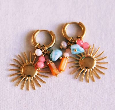 Oorbellen met cluster van eldenstenen en zon